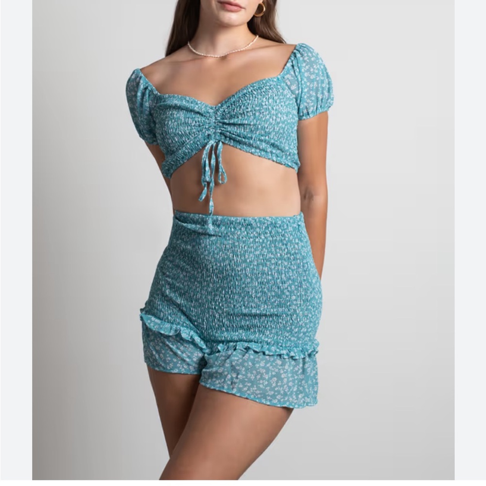Teal blue floral shorts